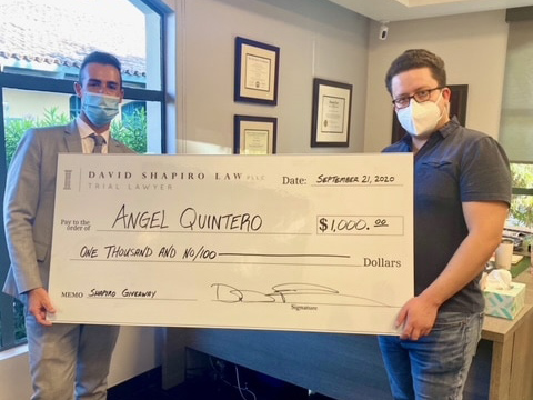 David Shapiro provides Scholarship Check to Angel Quintero