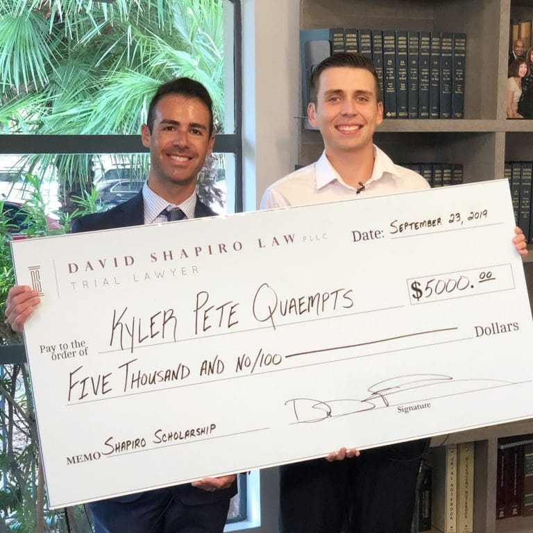 David Shapiro provides Scholarship Check to Kyler Pete Quaempts